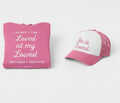 Pink hoodie and cap set with motivational text on a white background